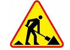 Znak roboty na drodze